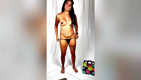 Indian tattooed slut with small legs tries on pantyhose