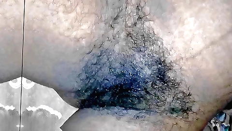 Shally dulavia is wearing a white dress and she is on a solo sex video