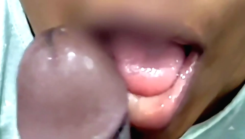 Busty babe with a nice face takes a dick to mouth in close-up