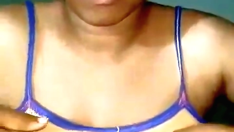 Brunette chick with big breasts showing off her body on web cam