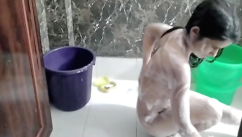 Busty indian woman naked and masturbates to the side