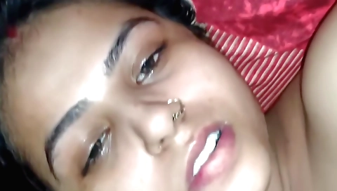 Amateur brunette chick showing her big natural breasts