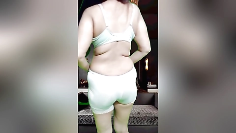 Sexy brunette housewife gets naked and enjoys fucking