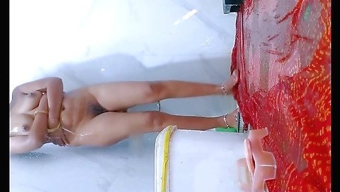 Indian hottie in a bathroom with some hairy pussy play