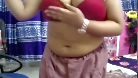 Busty brunette in her white bikini shows off her big boobs