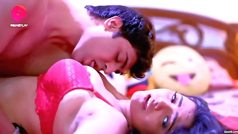 Milf with big tits and a pair of tits is sitting on her sofa