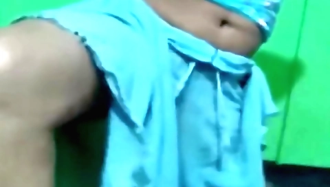 Sexy amateur brunette wearing a sexy dress dancing