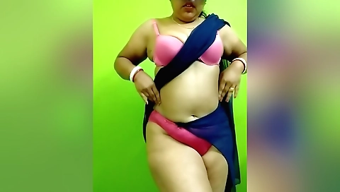 A sexy chick in a black dress makes a sexy live show