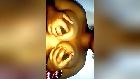 Asian chick with big round boobs showing off her hairy pussy