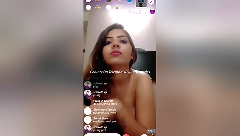 Indian teen in a sexy outfit shows off her tits and pussy