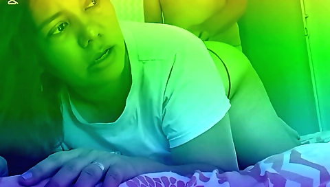 Indian brunette milf sucking her man's cock in the bedroom