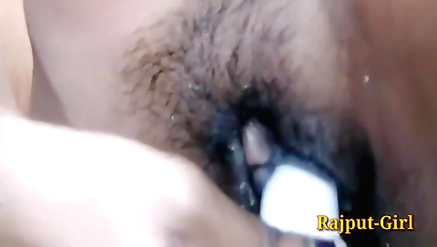 Indian girl gives her hairy self a hot fuck with camera