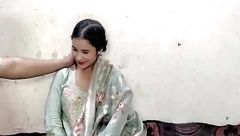 A beautiful little blonde shows her body to a camera