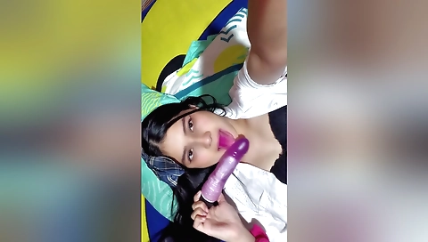 Brunette brunette is showing off her boobs in this solo video