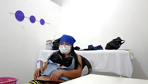 Solo girl with brown hair masturbating in her bedroom