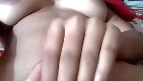 Busty brunette gets naked and shows off her hairy pussy