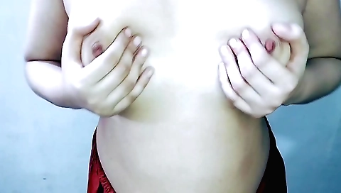Female with big boobs and tits playing with fingers in webcam