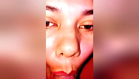 Sexy milf in the kitchen showing off her sexy face