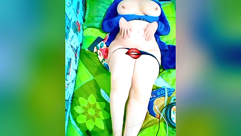 Amateur brunette in a sexy bikini shows off her big and round tits