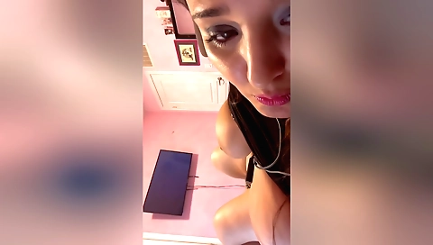 Brunette masturbating in the bedroom and squirting on the bed