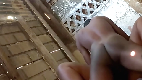 Brunette in short dress with a pink dress enjoys touching