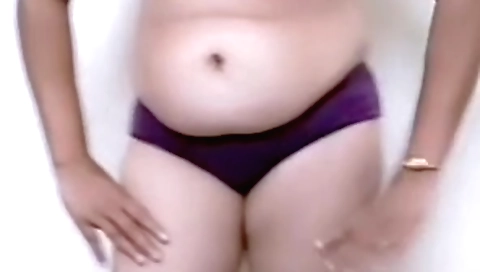 Striptease show of a sexy wife in amateur cam video