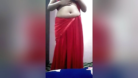 Indian girl massages her own tits and pussy for an erotic solo video