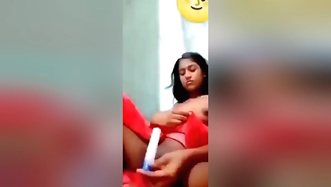 A really cute brunette in sexy lingerie fucks in solo