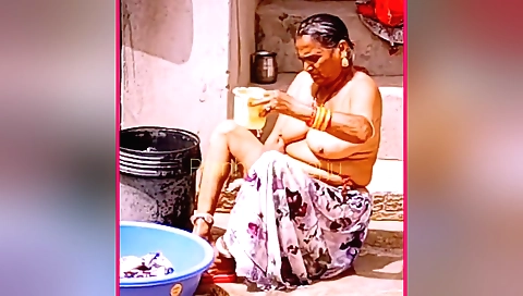 Busty Indian granny in her homemade solo outdoor vid